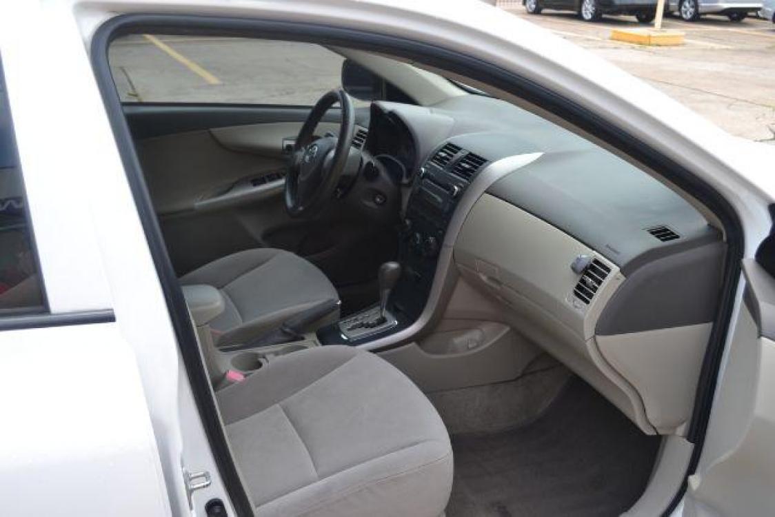 2010 Super White /Bisque Cloth Interior Toyota Corolla LE 4-Speed AT (JTDBU4EEXAJ) with an 1.8L L4 DOHC 16V engine, 4-Speed Automatic transmission, located at 1355 North 11th Street, Beaumont, 77702, (409) 832-0006, 30.094290, -94.130096 - Photo #19