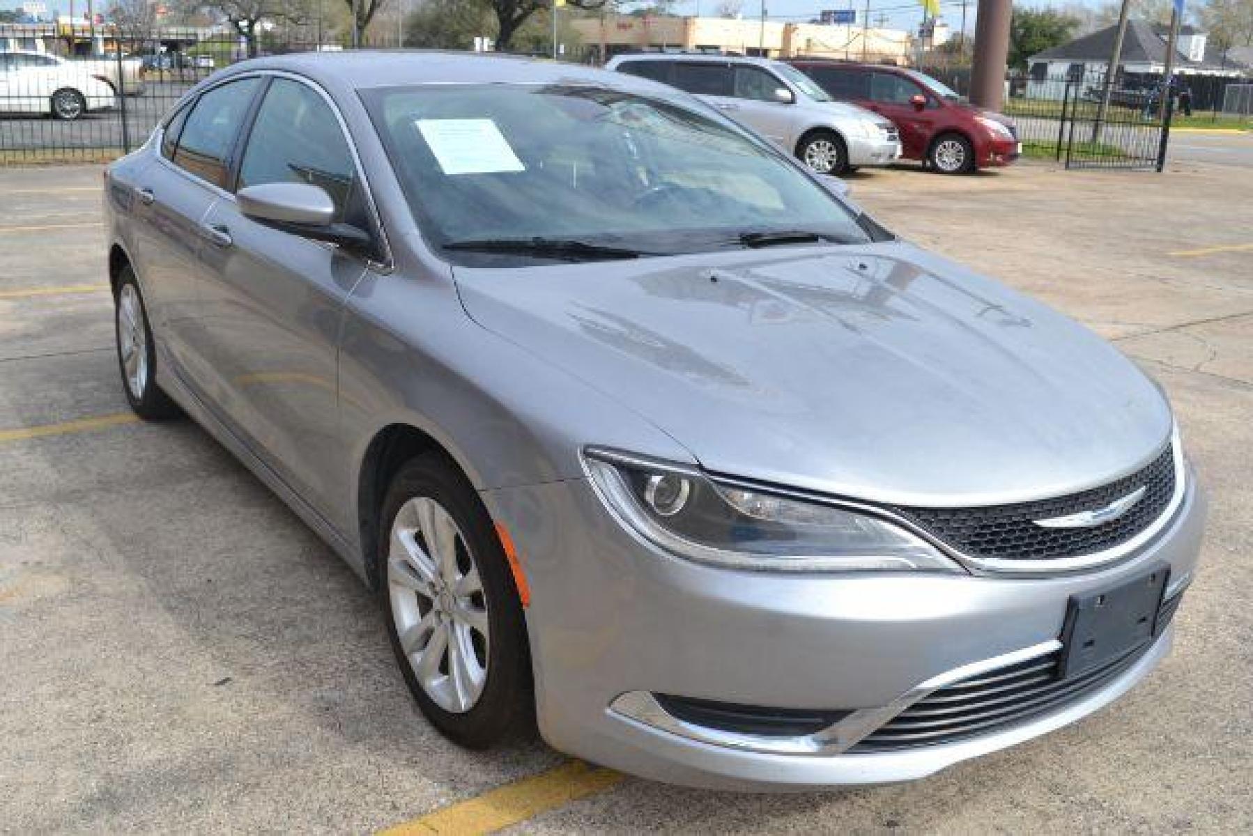 2015 Billet Silver Metallic CC /Black Chrysler 200 Limited (1C3CCCAB1FN) with an 2.4L L4 DOHC 16V engine, 9-Speed Automatic transmission, located at 1355 North 11th Street, Beaumont, 77702, (409) 832-0006, 30.094290, -94.130096 - Photo #26