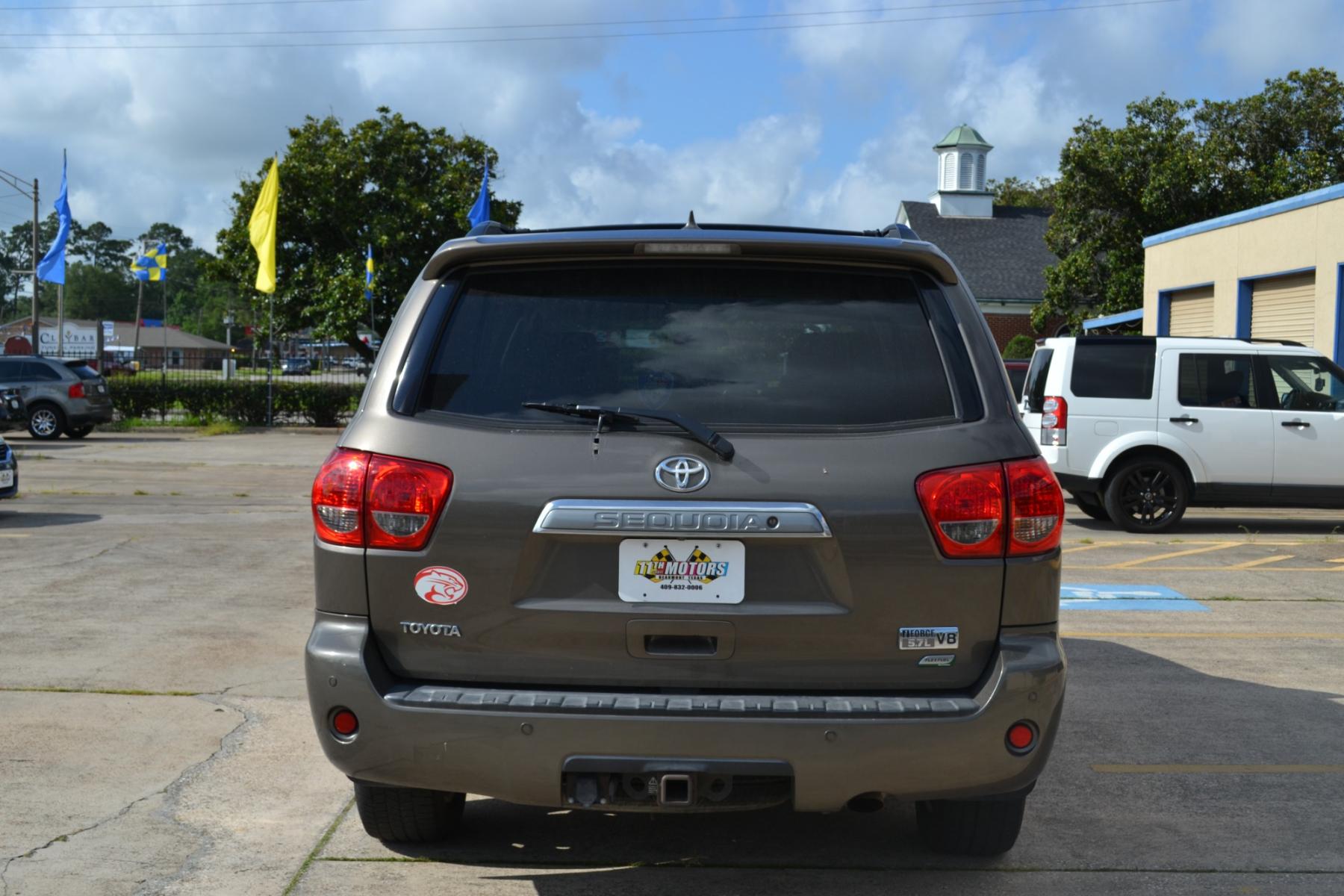 2010 Pyrite Mica /Graphite Leather Interior Toyota Sequoia Limited 4WD FFV (5TDJW5G19AS) with an 5.7L V8 DOHC 32V FFV engine, 6-Speed Automatic transmission, located at 1355 North 11th Street, Beaumont, 77702, (409) 832-0006, 30.094290, -94.130096 - Photo #3