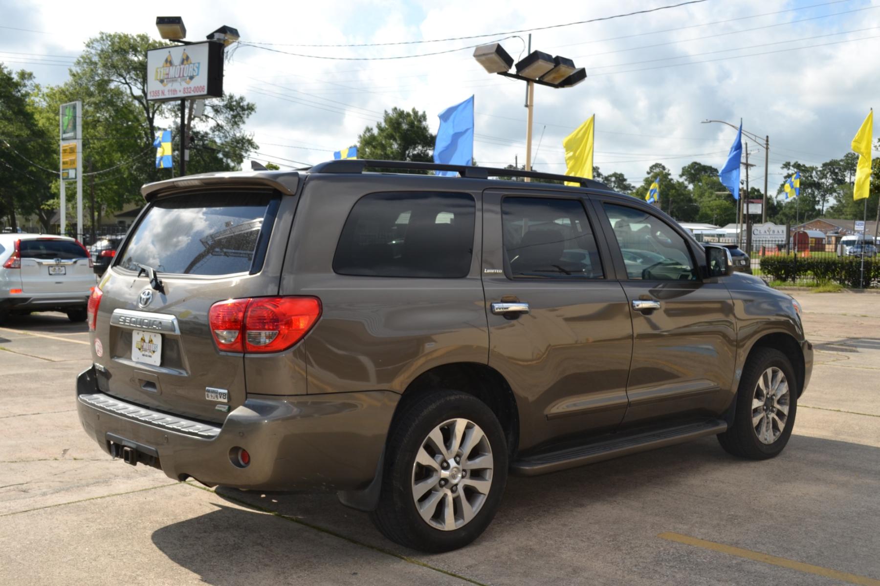 2010 Pyrite Mica /Graphite Leather Interior Toyota Sequoia Limited 4WD FFV (5TDJW5G19AS) with an 5.7L V8 DOHC 32V FFV engine, 6-Speed Automatic transmission, located at 1355 North 11th Street, Beaumont, 77702, (409) 832-0006, 30.094290, -94.130096 - Photo #4