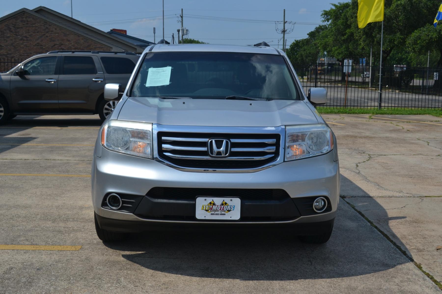 2014 Alabaster Silver Metallic /Gray Honda Pilot EX-L 2WD 5-Spd AT (5FNYF3H55EB) with an 3.5L V6 SOHC 24V engine, 5-Speed Automatic transmission, located at 1355 North 11th Street, Beaumont, 77702, (409) 832-0006, 30.094290, -94.130096 - Photo #7
