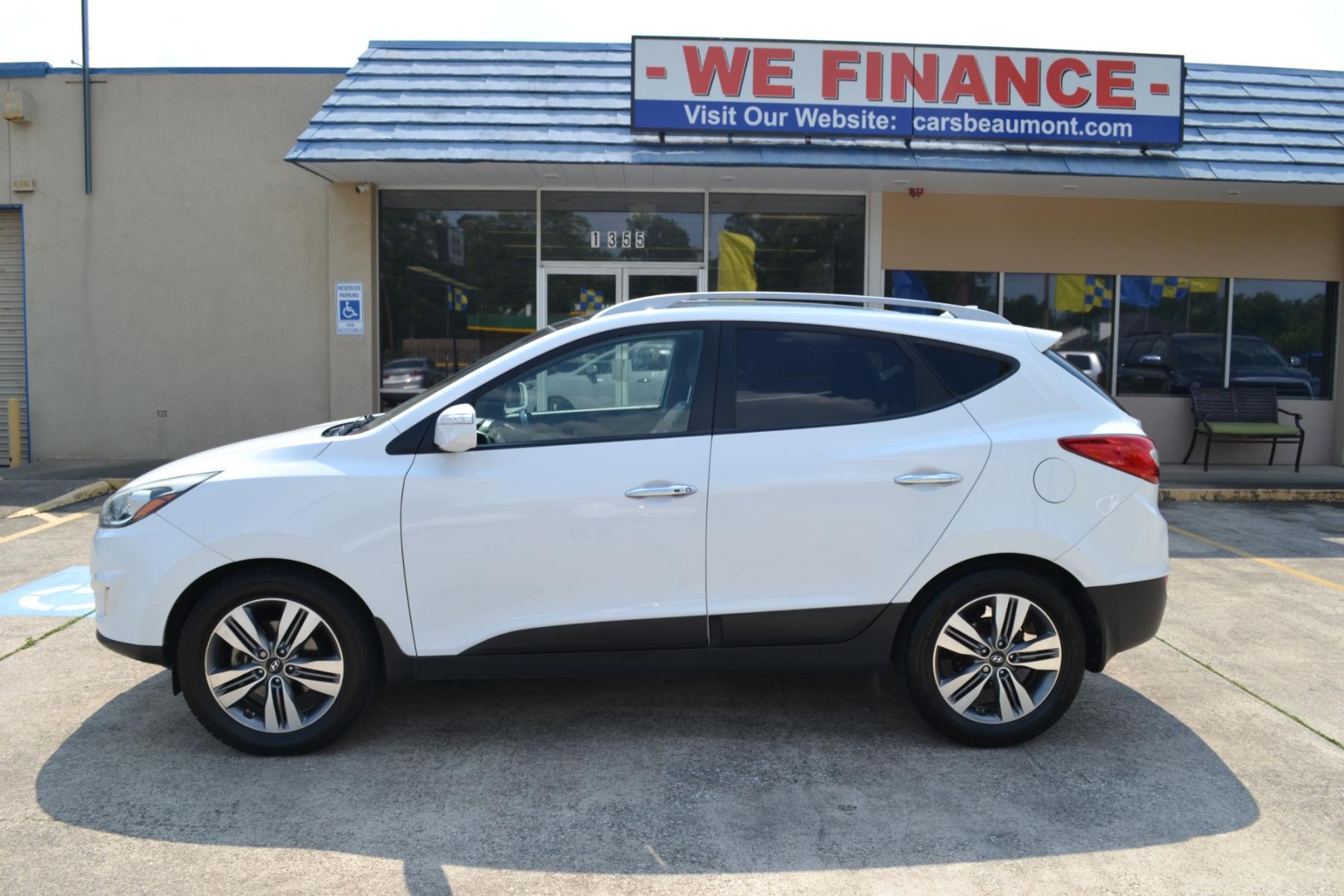 2014 Winter White /Taupe Hyundai Tucson GLS 2WD (KM8JU3AG6EU) with an 2.4L L4 DOHC 16V engine, 6-Speed Automatic transmission, located at 1355 North 11th Street, Beaumont, 77702, (409) 832-0006, 30.094290, -94.130096 - Photo #1