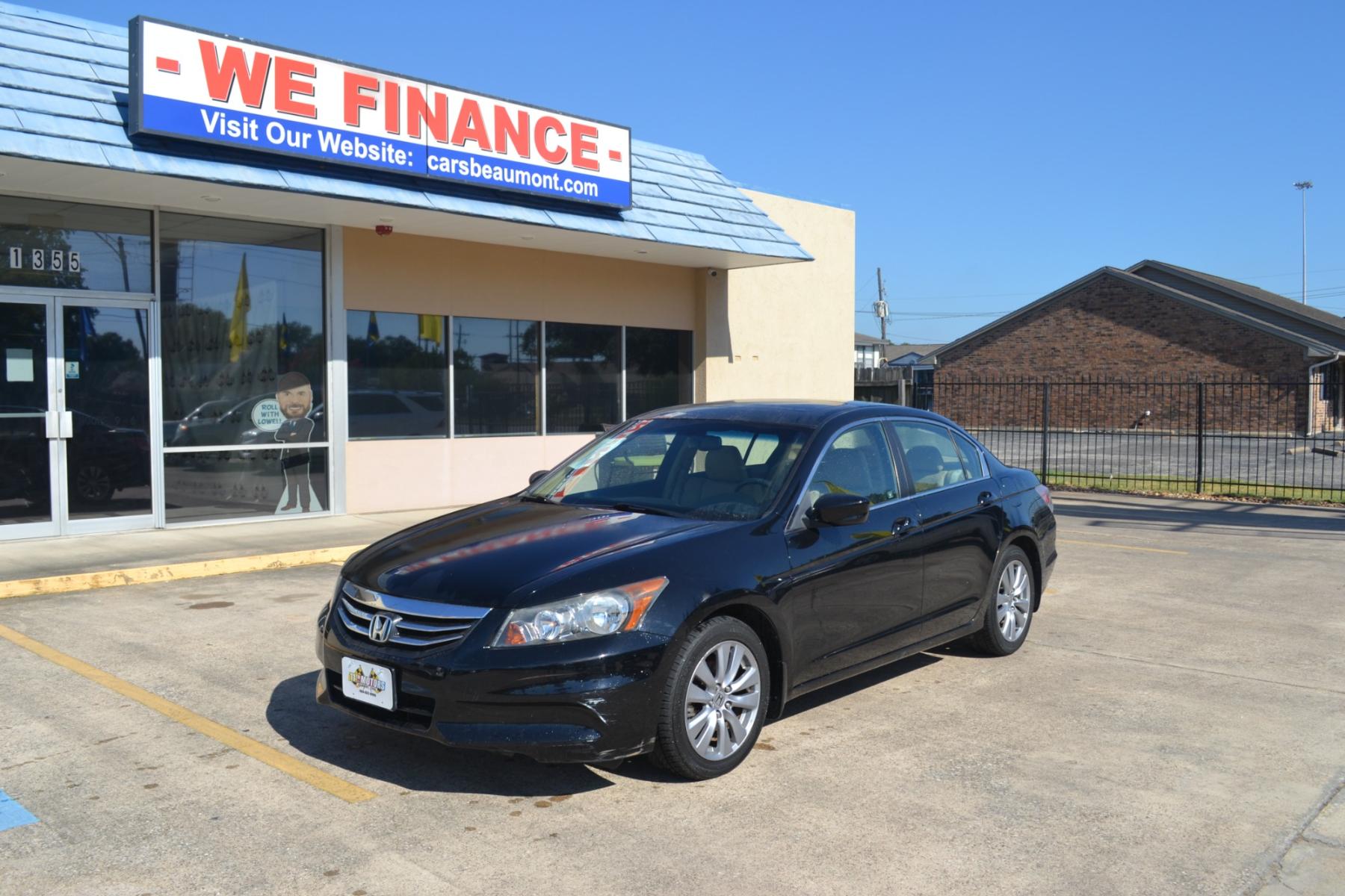 2011 Crystal Black Pearl /Ivory Leather Interior Honda Accord EX-L Sedan AT with Navigation (1HGCP2F83BA) with an 2.4L L4 DOHC 16V engine, 5-Speed Automatic transmission, located at 1355 North 11th Street, Beaumont, 77702, (409) 832-0006, 30.094290, -94.130096 - Photo #0