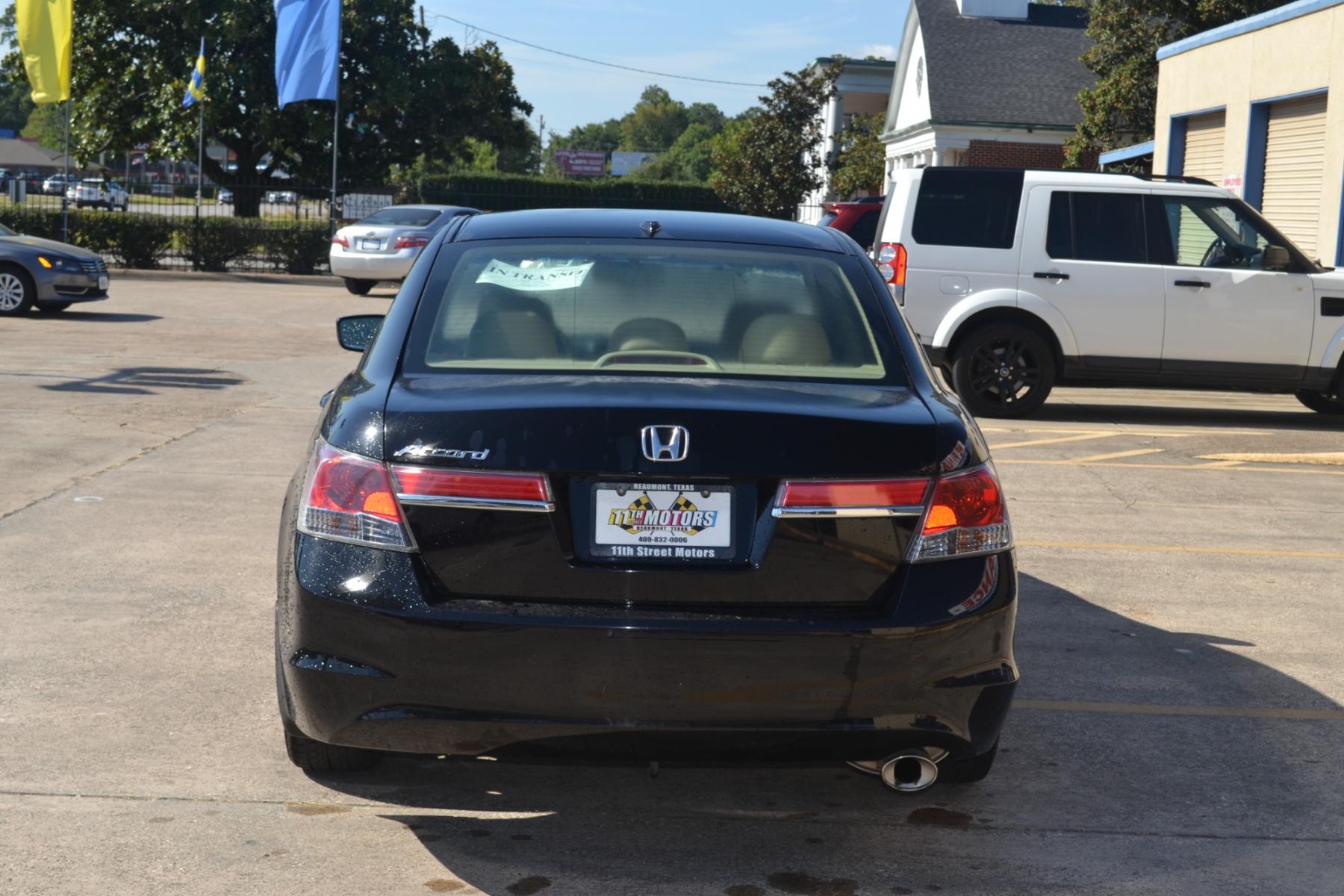 2011 Crystal Black Pearl /Ivory Leather Interior Honda Accord EX-L Sedan AT with Navigation (1HGCP2F83BA) with an 2.4L L4 DOHC 16V engine, 5-Speed Automatic transmission, located at 1355 North 11th Street, Beaumont, 77702, (409) 832-0006, 30.094290, -94.130096 - Photo #3