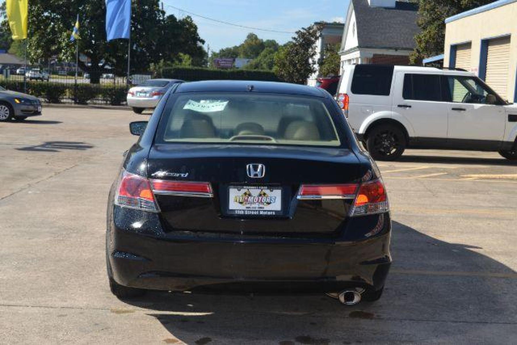 2011 Crystal Black Pearl /Ivory Leather Interior Honda Accord EX-L Sedan AT with Navigation (1HGCP2F83BA) with an 2.4L L4 DOHC 16V engine, 5-Speed Automatic transmission, located at 1355 North 11th Street, Beaumont, 77702, (409) 832-0006, 30.094290, -94.130096 - Photo #20