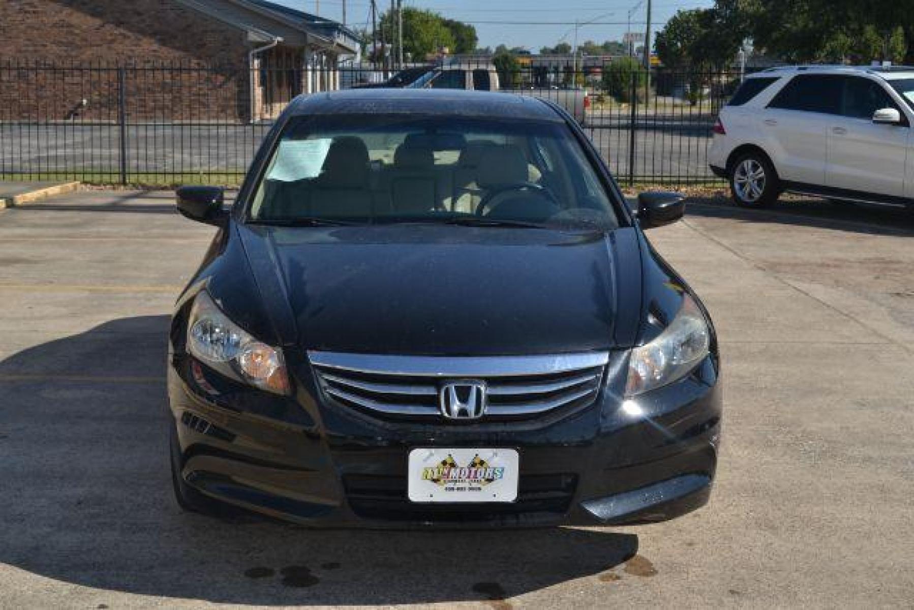 2011 Crystal Black Pearl /Ivory Leather Interior Honda Accord EX-L Sedan AT with Navigation (1HGCP2F83BA) with an 2.4L L4 DOHC 16V engine, 5-Speed Automatic transmission, located at 1355 North 11th Street, Beaumont, 77702, (409) 832-0006, 30.094290, -94.130096 - Photo #24