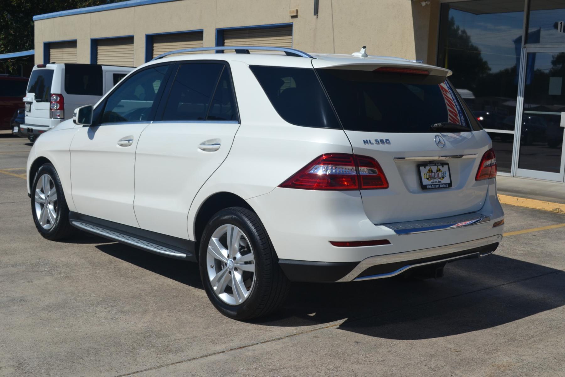 2014 Polar White /Almond Beige/Black Mercedes-Benz M-Class ML350 4MATIC (4JGDA5JB7EA) with an 3.5L V6 DOHC 24V engine, 7-Speed Automatic transmission, located at 1355 North 11th Street, Beaumont, 77702, (409) 832-0006, 30.094290, -94.130096 - Photo #2