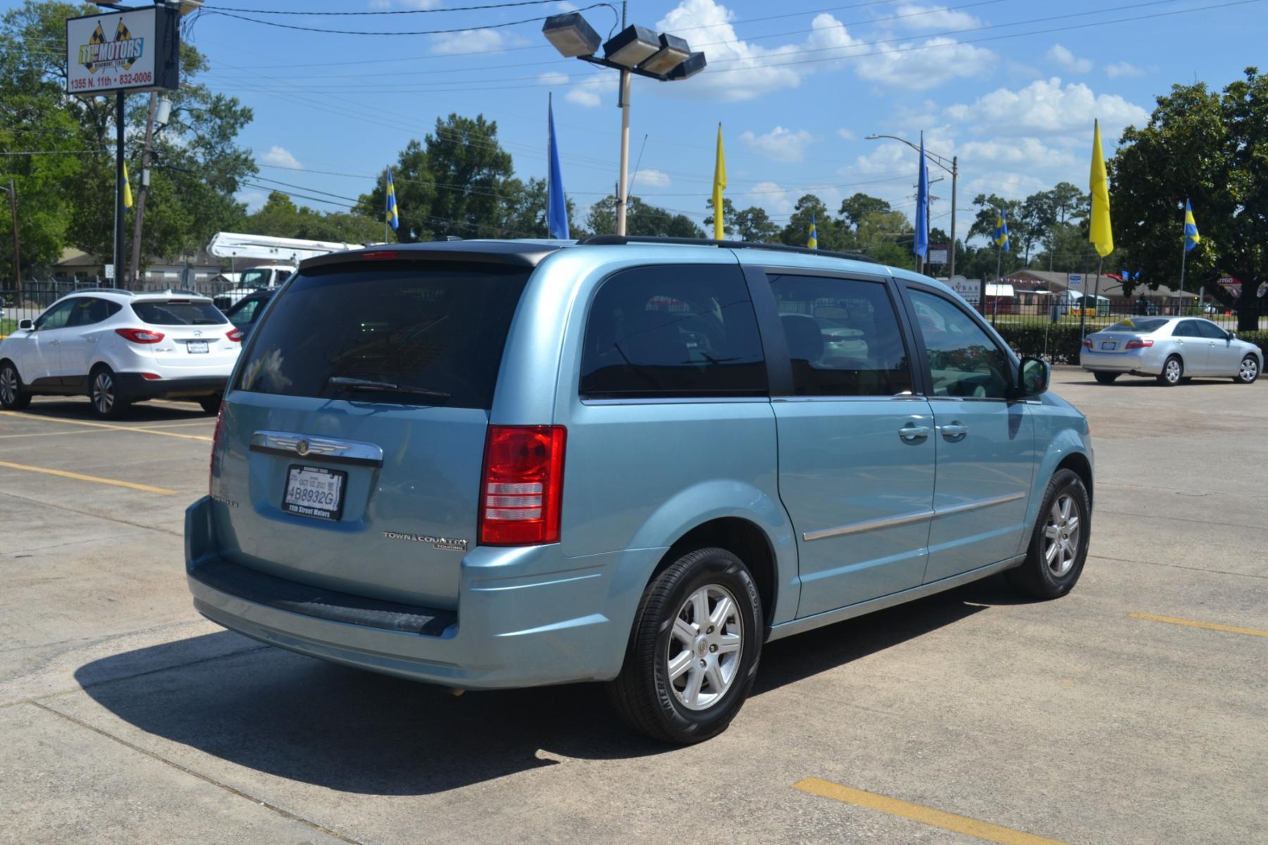 2010 Clearwater Blue Pearl /Medium Slate Gray/Light Shale Cloth Interior Chrysler Town and Country Touring (2A4RR5D16AR) with an 3.8L V6 OHV 12V engine, 6-Speed Automatic transmission, located at 1355 North 11th Street, Beaumont, 77702, (409) 832-0006, 30.094290, -94.130096 - Photo #4