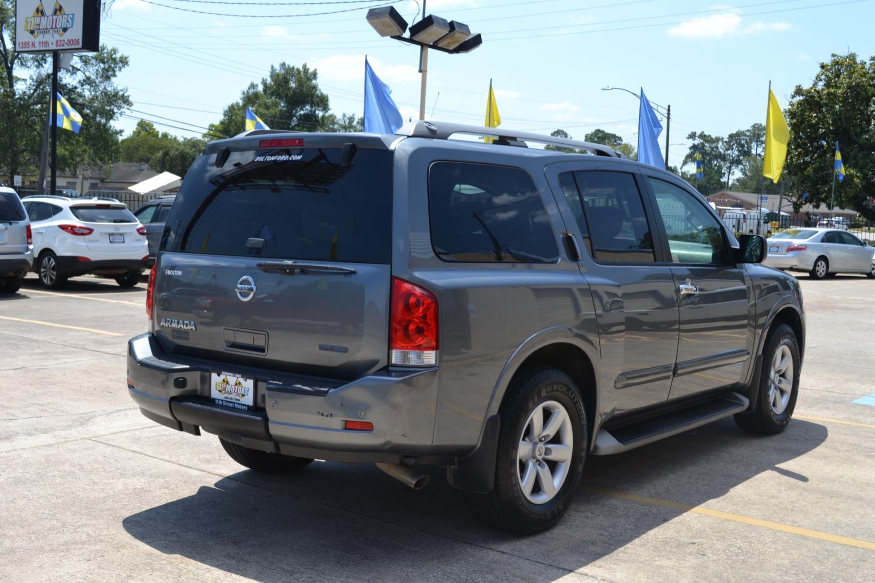2013 Gun Metallic /Charcoal Nissan Armada SL 2WD (5N1BA0ND5DN) with an 5.6L V8 DOHC 32V FFV engine, 5-Speed Automatic transmission, located at 1355 North 11th Street, Beaumont, 77702, (409) 832-0006, 30.094290, -94.130096 - Photo #4