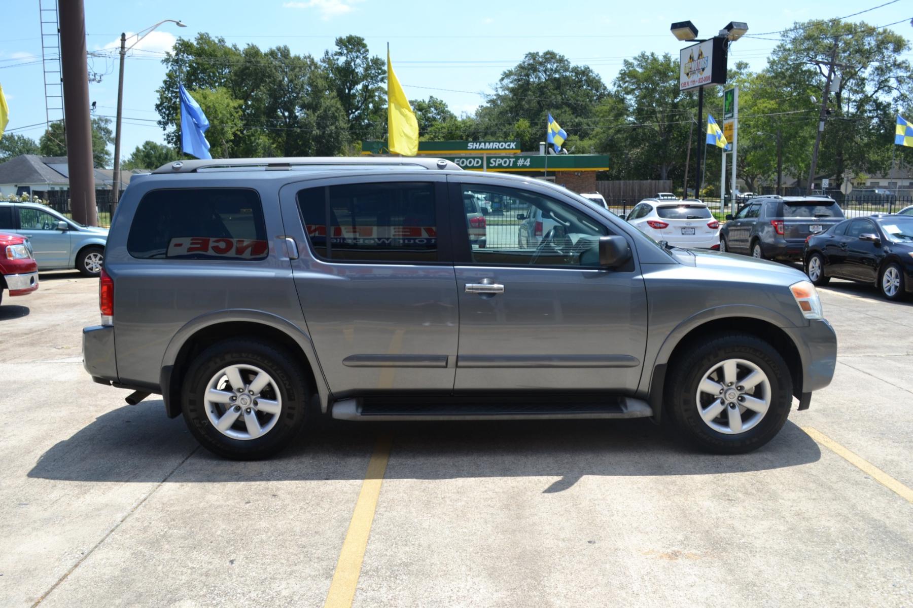 2013 Gun Metallic /Charcoal Nissan Armada SL 2WD (5N1BA0ND5DN) with an 5.6L V8 DOHC 32V FFV engine, 5-Speed Automatic transmission, located at 1355 North 11th Street, Beaumont, 77702, (409) 832-0006, 30.094290, -94.130096 - Photo #5