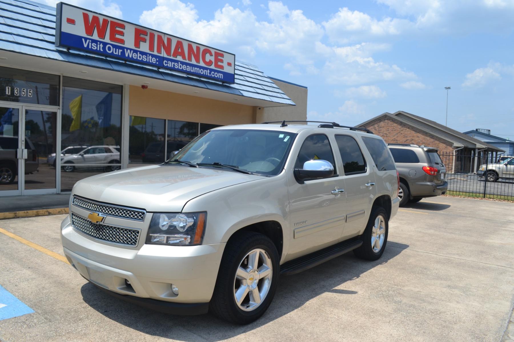 2013 Champagne Silver Metallic /Light Cashmere/Dark Cashmere Leather Interior Chevrolet Tahoe LT 2WD (1GNSCBE08DR) with an 5.3L V8 OHV 16V FFV engine, 6-Speed Automatic transmission, located at 1355 North 11th Street, Beaumont, 77702, (409) 832-0006, 30.094290, -94.130096 - Photo #0