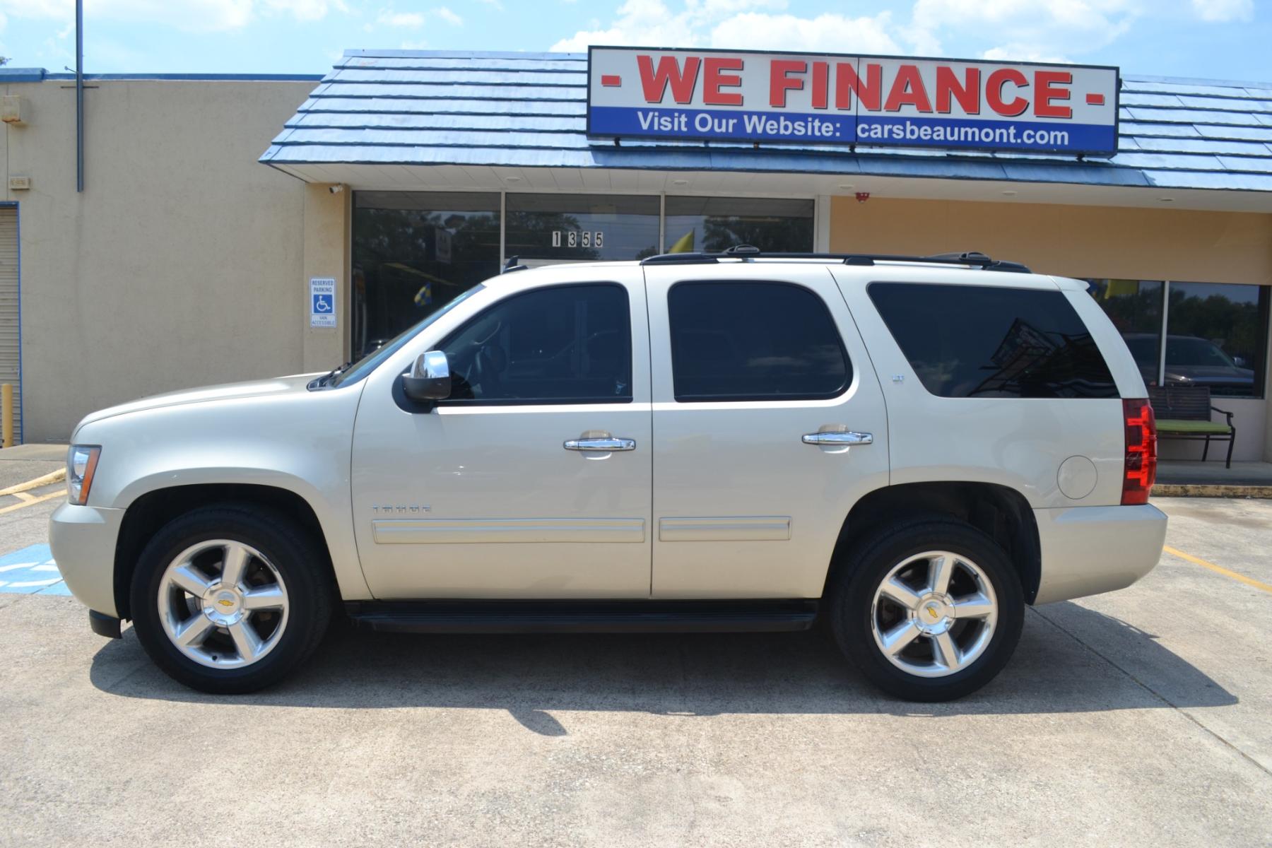 2013 Champagne Silver Metallic /Light Cashmere/Dark Cashmere Leather Interior Chevrolet Tahoe LT 2WD (1GNSCBE08DR) with an 5.3L V8 OHV 16V FFV engine, 6-Speed Automatic transmission, located at 1355 North 11th Street, Beaumont, 77702, (409) 832-0006, 30.094290, -94.130096 - Photo #1