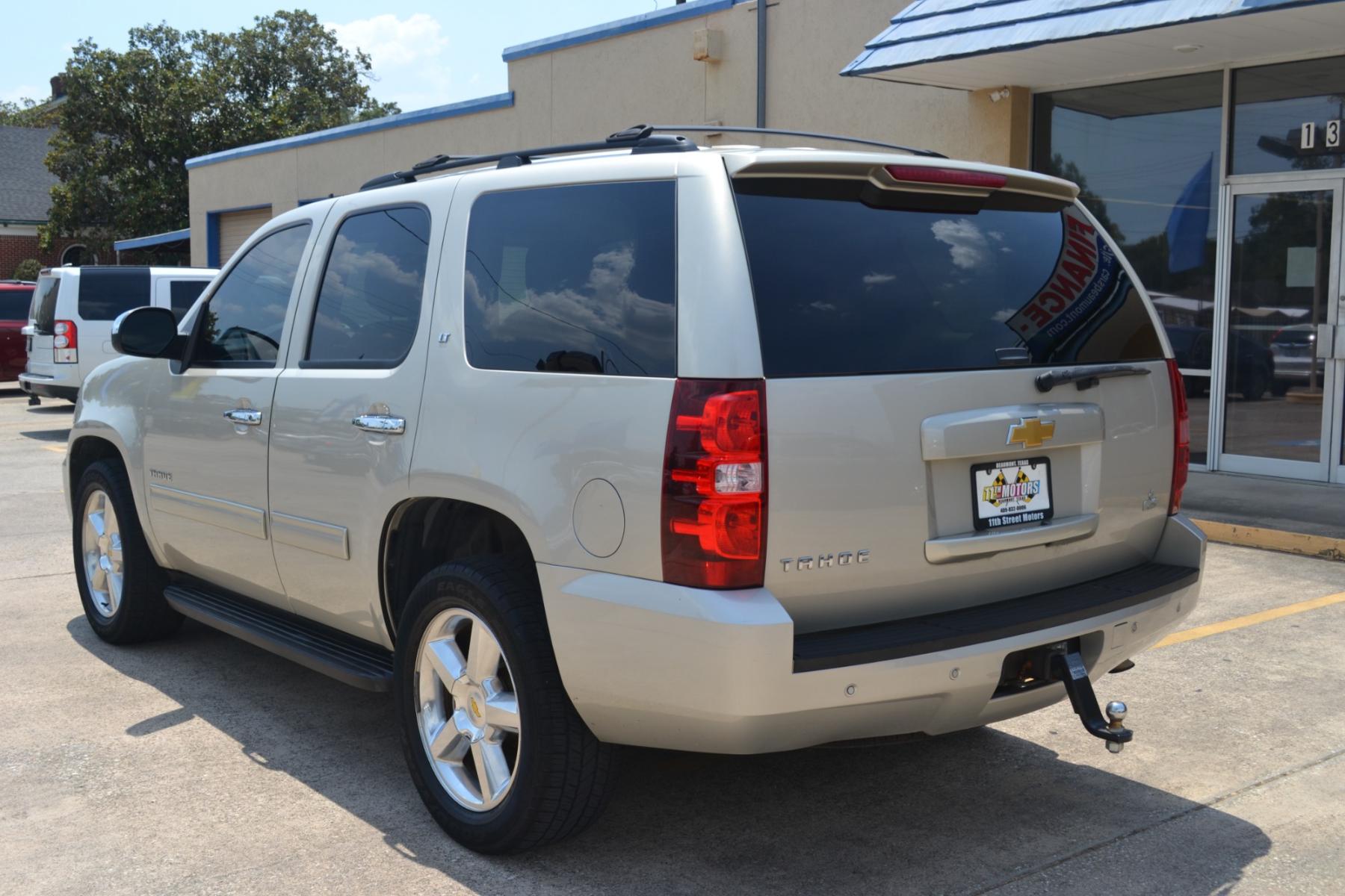 2013 Champagne Silver Metallic /Light Cashmere/Dark Cashmere Leather Interior Chevrolet Tahoe LT 2WD (1GNSCBE08DR) with an 5.3L V8 OHV 16V FFV engine, 6-Speed Automatic transmission, located at 1355 North 11th Street, Beaumont, 77702, (409) 832-0006, 30.094290, -94.130096 - Photo #2